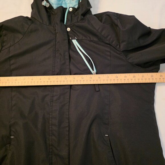 Beautiful slightly used Izod women's black ski jacket with teal accent. Size L. - Picture 10 of 12